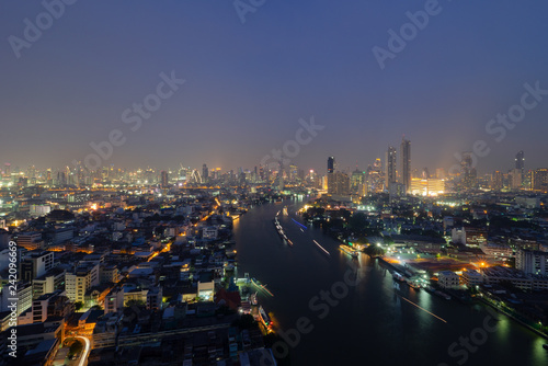 View of Bangkok city at night with chao phra ya river