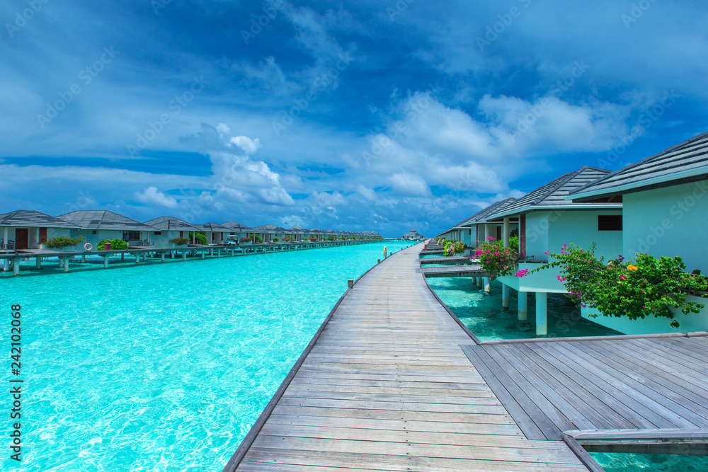 Maldives water bungalow on ocean water landscape