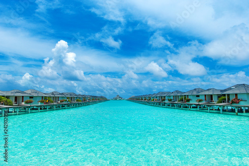 Maldives water bungalow on ocean water landscape