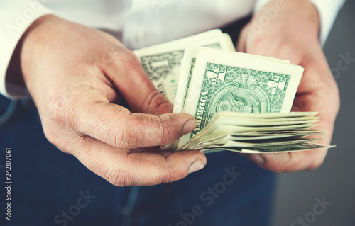 man hand money