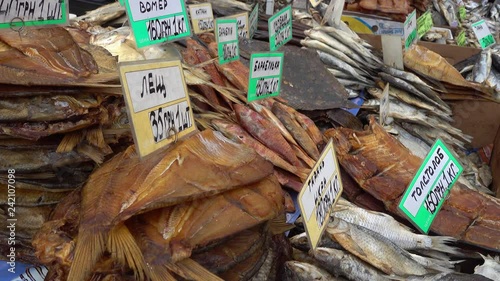 4K Close up salted dried and cured fish for sale with prices photo