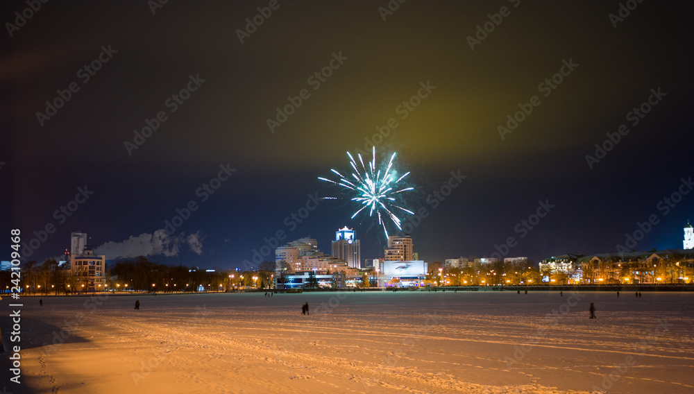 01/04/2019 Yekaterinburg. Russia Evening Yekaterinburg, view from the embankment of the city pond to the residential high-rise, the concert and cinema 