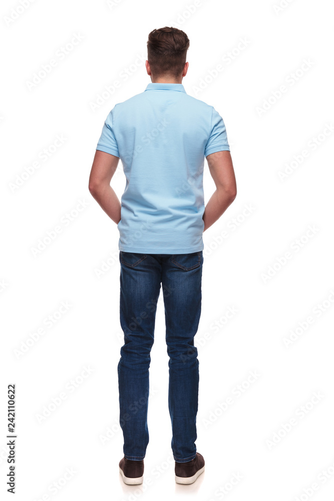 rear view of relaxed casual man wearing blue polo shirt rear view of relaxed casual man wearing blue polo shirt