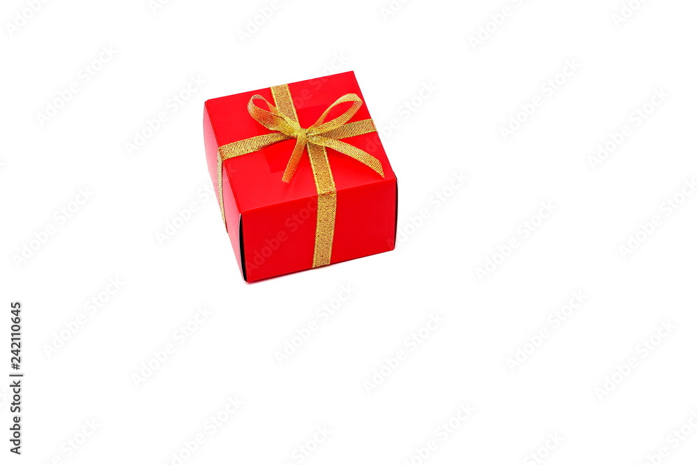 Red box with a bow of Golden ribbon. Gift. Holiday. Red box with a bow of Golden ribbon. Gift. Holiday.