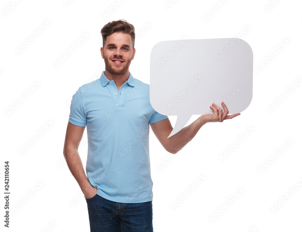 portrait of relaxed man wearing polo shirt holding speech bubble portrait of relaxed man wearing polo shirt holding speech bubble