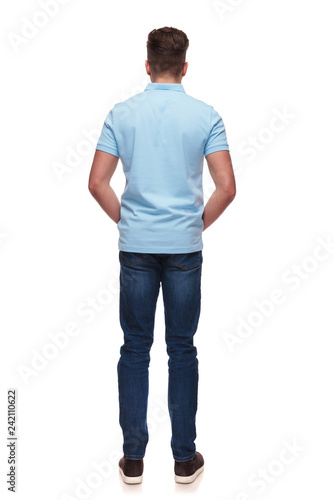 rear view of relaxed casual man wearing blue polo shirt © Viorel Sima