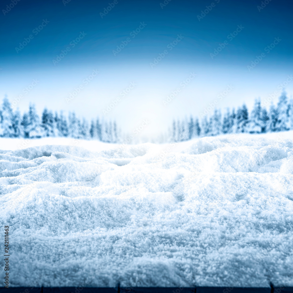 Table background of snow flakes and free space for your decoration Table background of snow flakes and free space for your decoration