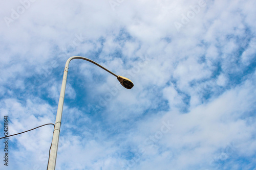 fresh clear blue sky with light cloud with street lamp