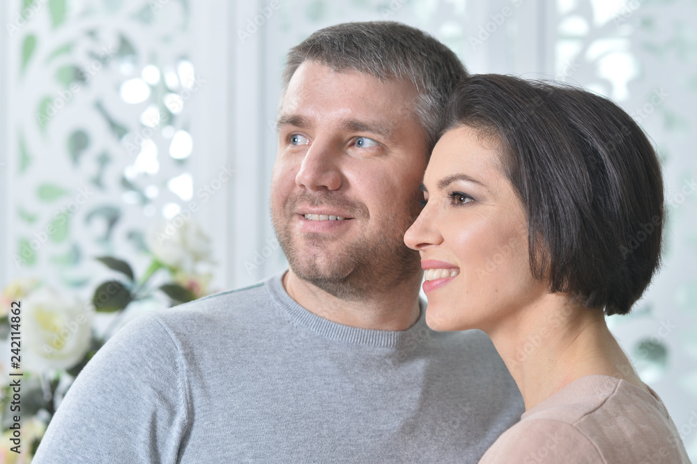 Obraz premium Portrait of happy beautiful a pretty couple posing