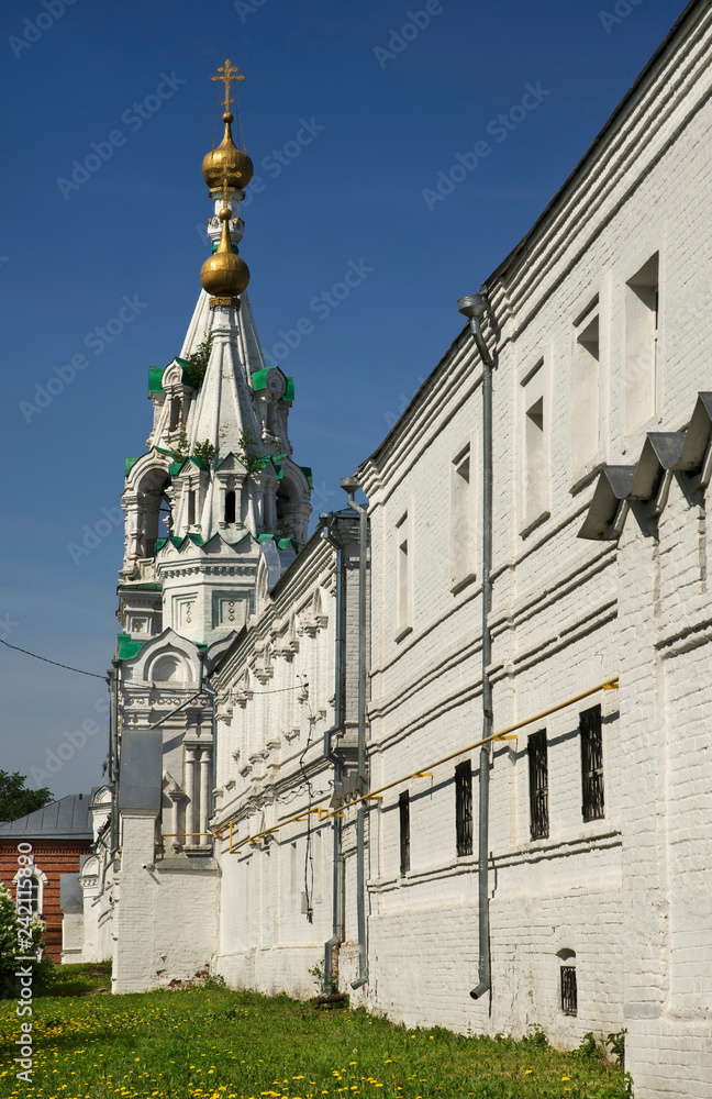 Fototapeta premium Belfry and church of Kazan Icon of Mother of God of Holy Trinity convent in Murom. Russia