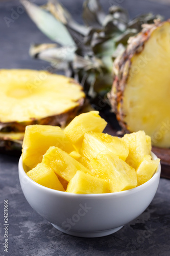 Fresh sliced pineapple on table