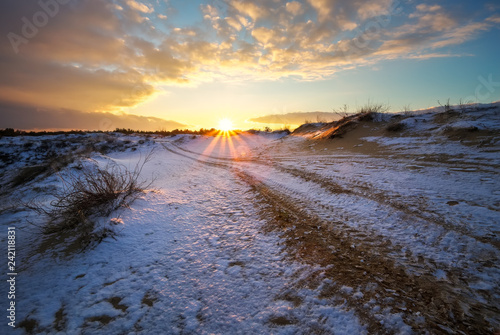 ATV auto sport track at winter. Wheel sandy tracks on snow