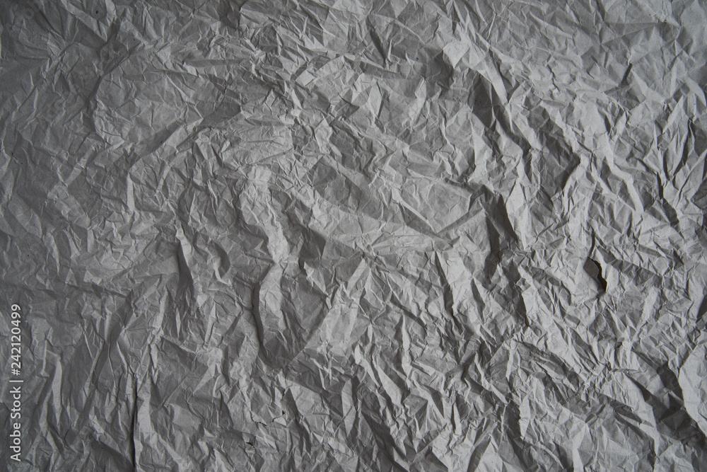 Grey crumpled wrapping paper background, texture of grey wrinkled of old  vintage paper, creases on the surface of gray paper. Stock Photo | Adobe  Stock