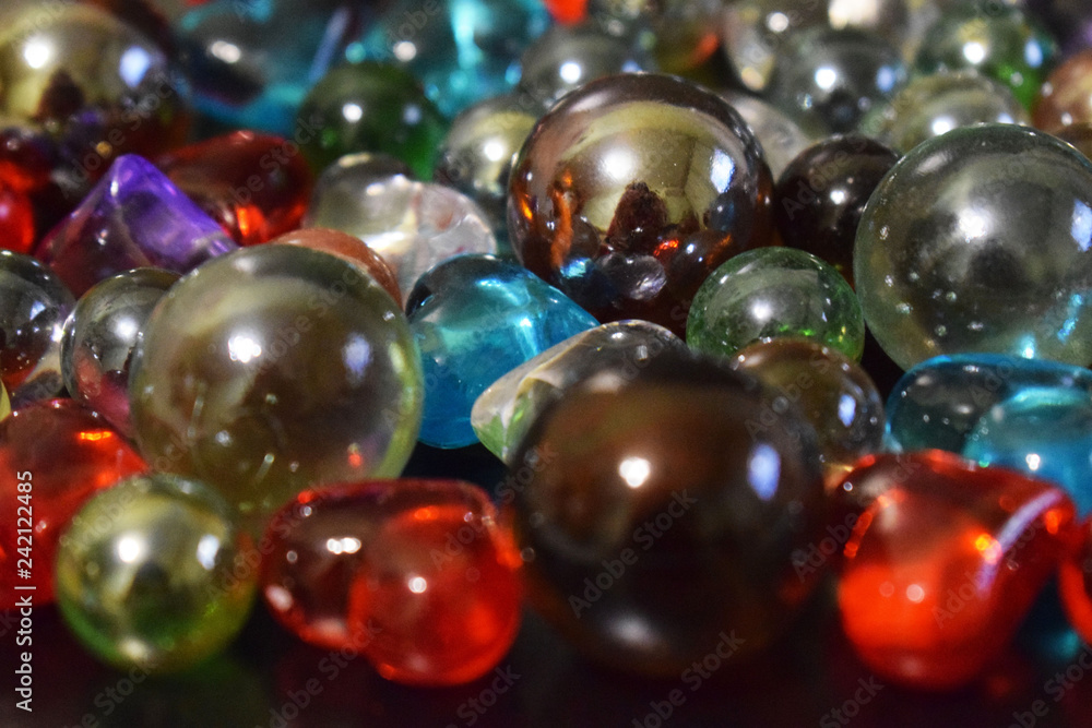 Multi-colored shiny glass balls close-up. Multi-colored shiny glass balls close-up.