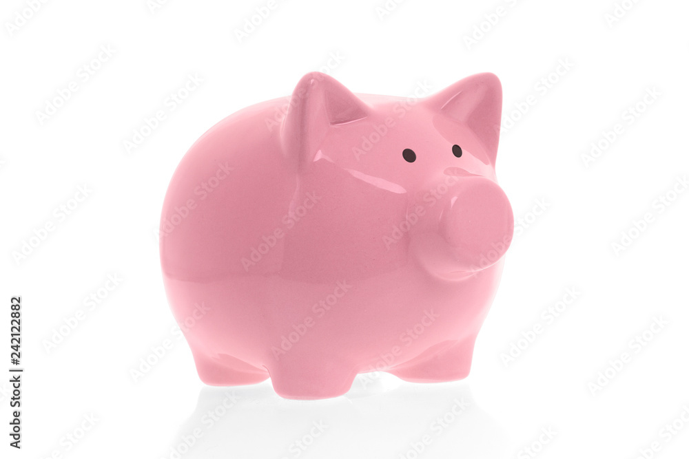 Ceramic pink piggy bank on white background