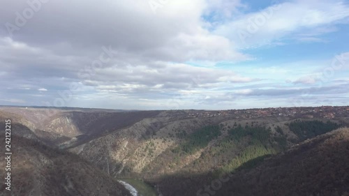 Cloudy sky over curvy flow of river Timok 4K aerial video photo