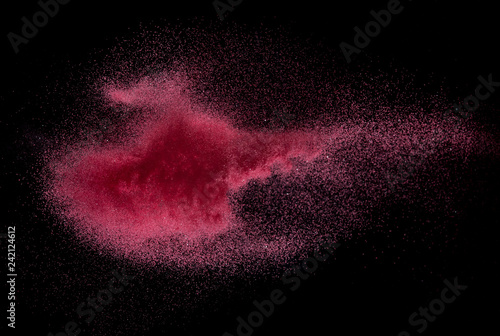 Red Sand explosion isolated on over dark background,Abstract sand cloud,Motion blur