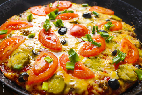 Pizza with olives. Hot delicious pizza with tomatoes, cheese, olives and green onions
