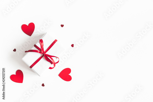 Valentine's Day background. Gift box on white background. Valentines day concept. Flat lay, top view, copy space © Flaffy