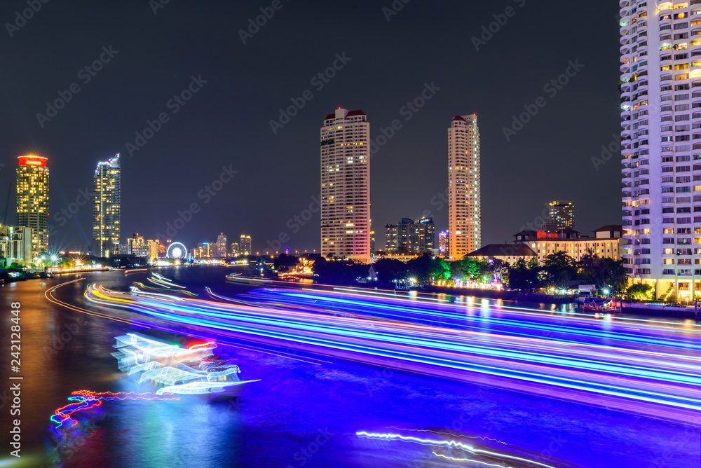 blur light of boat moving at the river of City