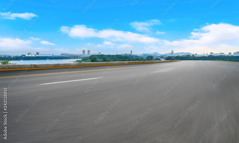 Empty asphalt road square and natural landscape under the blue sky Empty asphalt road square and natural landscape under the blue sky