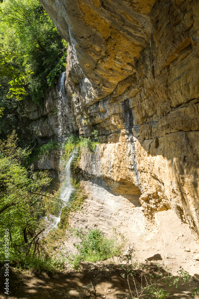 Fototapeta premium Landscape with Waterfall Skaklya near villages of Zasele and Bov at Vazov trail, Balkan Mountains, Bulgaria