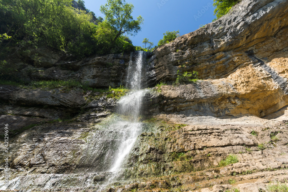 Fototapeta premium Landscape with Waterfall Skaklya near villages of Zasele and Bov at Vazov trail, Balkan Mountains, Bulgaria