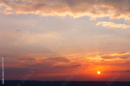 colorful dramatic sky with cloud at sunset.