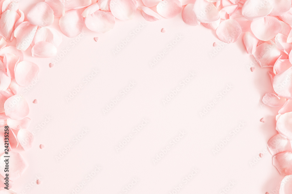 Flowers composition. Rose flower petals on pastel pink background. Valentine's Day, Mother's Day concept. Flat lay, top view, copy space Flowers composition. Rose flower petals on pastel pink background. Valentine's Day, Mother's Day concept. Flat lay, top view, copy space