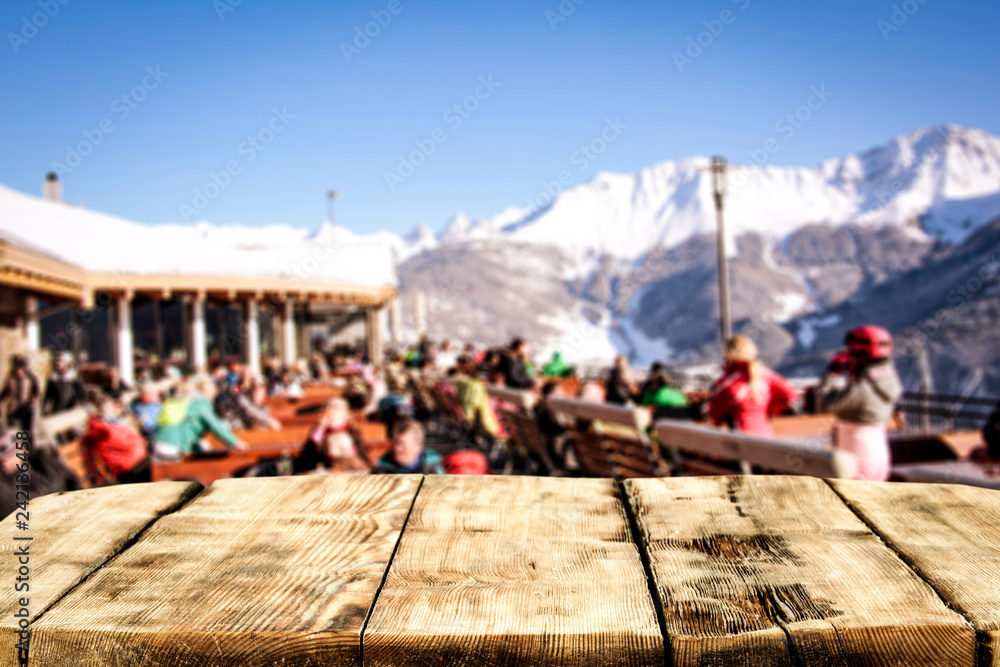 Winter table background in Alps and mountains landscape 