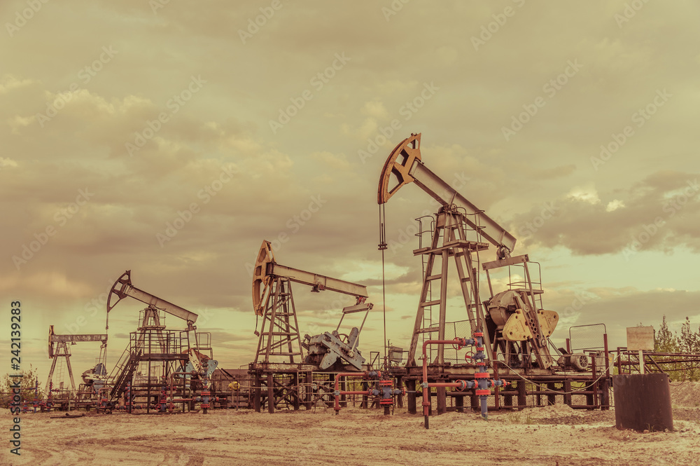 Pump jack. Extraction of oil. Petroleum concept. Pump jack. Extraction of oil. Petroleum concept.
