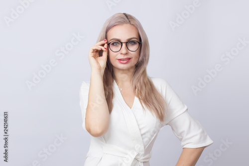 Blond woman wearing glasses