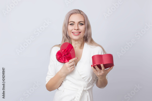 Blonde woman with red gift box