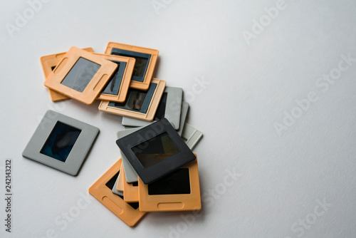 The collection of slides in frames on a white background. Selective focus. Copy space. photo