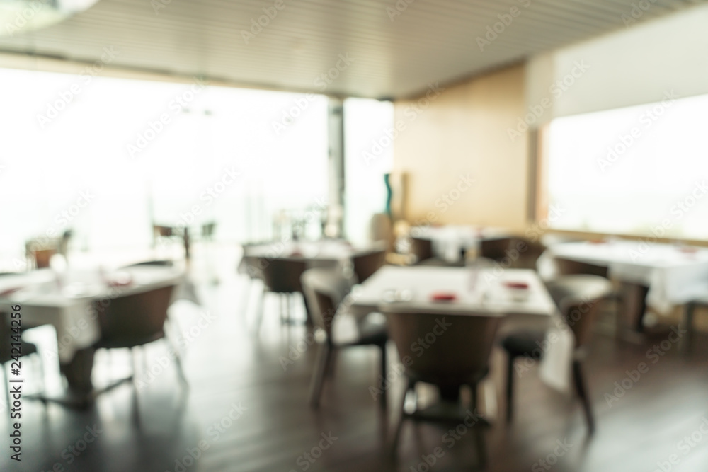 Abstract blur and defocused breakfast buffet at hotel restaurant interior