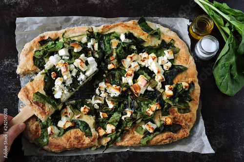 Fotografija Healthy homemade pizza with spinach and feta.