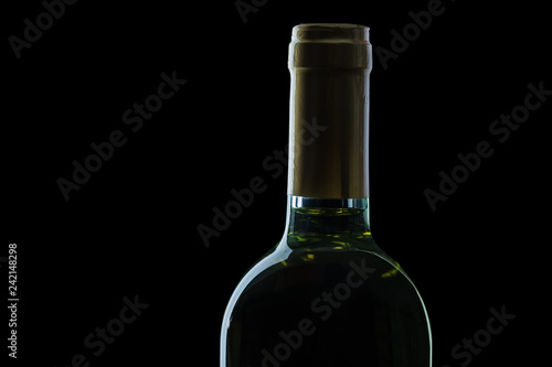 close up view on top of bottle white wine black background.