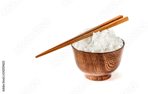 jasmine rice hot cooked in wooden bowl with chopsticks