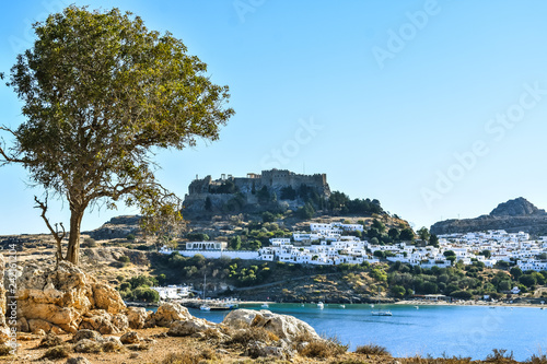 LINDOS,RHODES/GREECE OCTOBER 29 2018 : Lindos village and Lindos bay,photo taken from Kleovoulos Tomb hill. photo