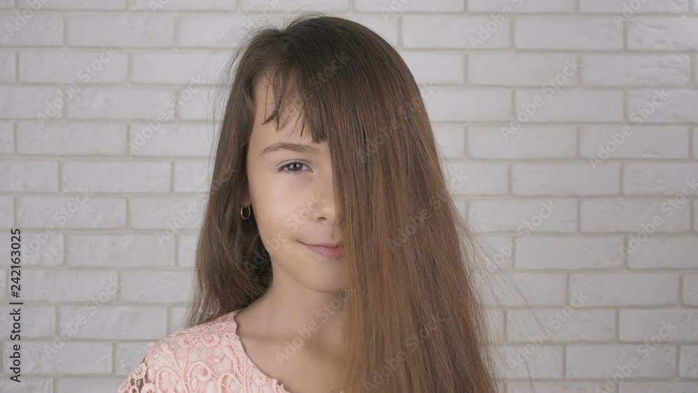 Appearence of static elecricity. Teenager girl with electrified hair. Appearence of static elecricity. Teenager girl with electrified hair.