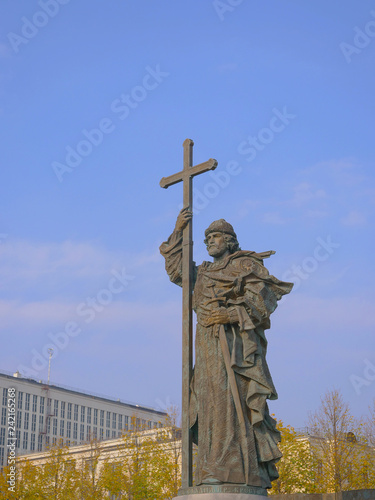 Bronze statue holding cross in Moscow Russia