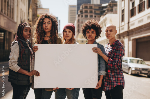 Female protesters with blank banner © Jacob Lund