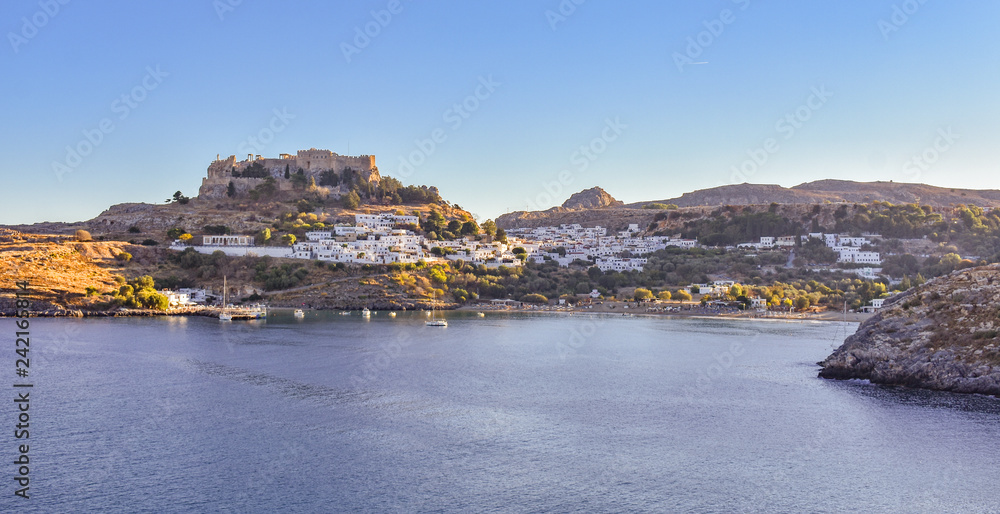 LINDOS,RHODES/GREECE OCTOBER 29 2018 : Lindos village and Lindos bay,photo taken from Kleovoulos Tomb hill.