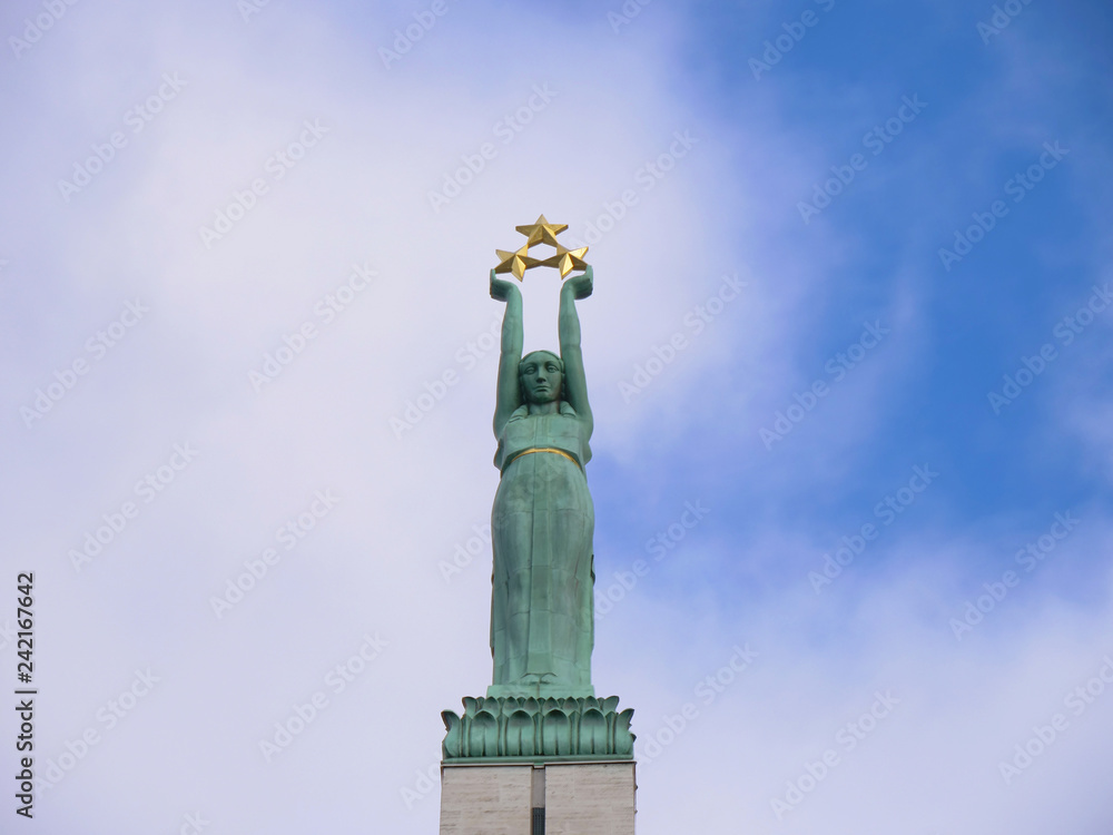 Famous landscape view of statue The Freedom Monument in Latvia Riga old town