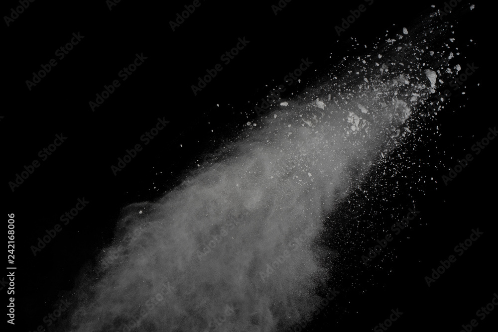 Fototapeta premium White powder explosion isolated on black background.