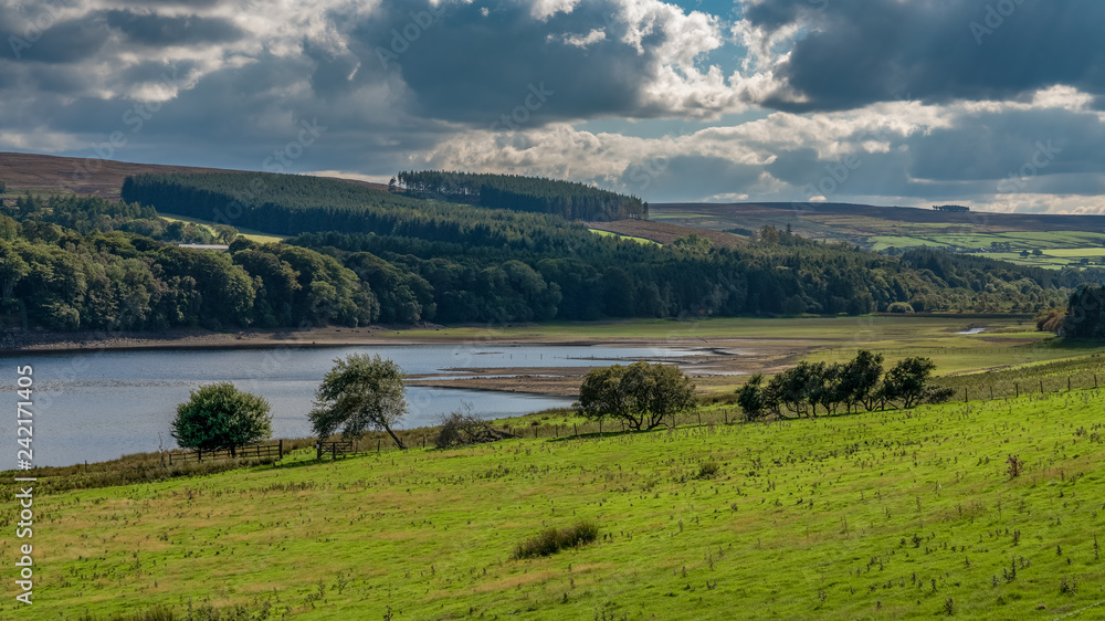 Clouds over the east side of the Derwent Reservoir, Northumberland, England, UK