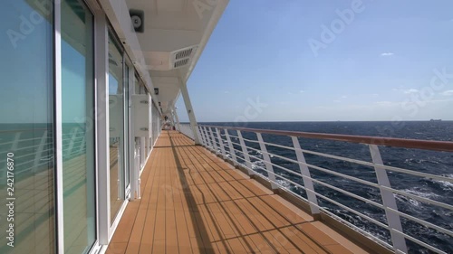 View down the deck and walkway of a cruise ship crossing the Atlantic