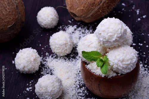 White sweets sprinkled with coconut flakes