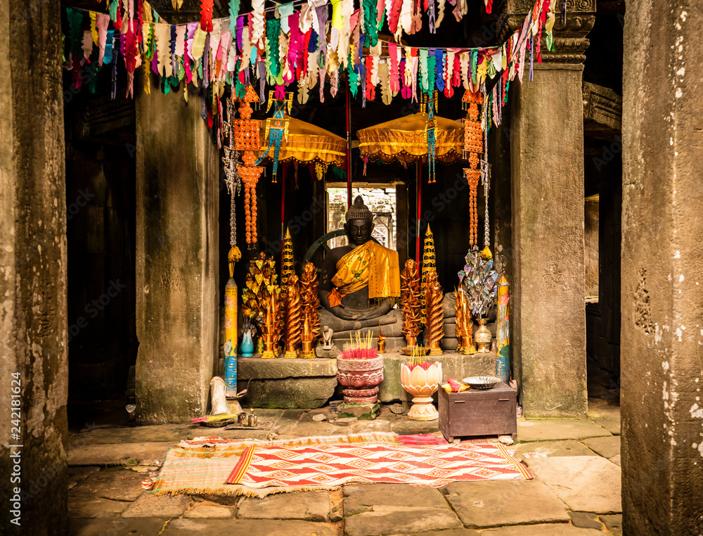 Buddha statue in a Cambodian temple. Buddha statue in a Cambodian temple.