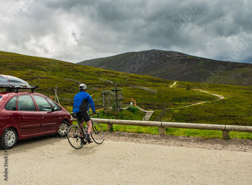 Sporty man cyclist training on Scottish routes